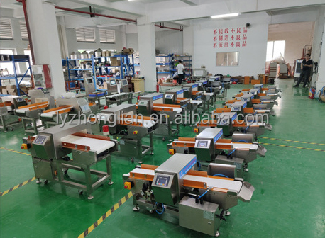 State-of-the-Art Metal Detector for Food Detection Industry Facing the Display Screen