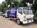 HOWO 5cbm Compactor Garbage Truck Compressed Waste Treatment Truck