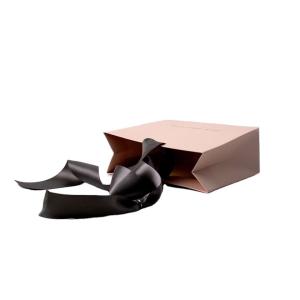 Wholesale Luxury Printed Custom Logo Clothing Gift Paper Packaging Bags with Hand Length Handle from china suppliers