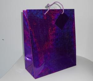 China fashion paper gift bag with customised size nice design and mini tag holographic paper bag on sale