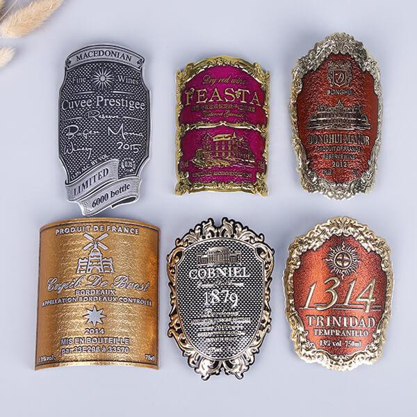 Arch shaped metal red wine bottle labels