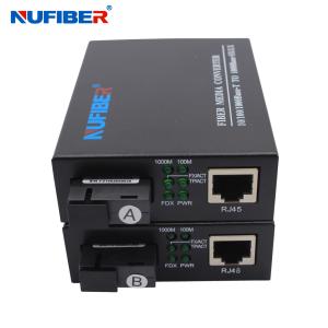 Wholesale Unamanged Gigabit Fiber Optical Media Converter 10/100/1000Mbps RJ45 to 1000Base SM 1310nm/1550nm 20km SC DC5V1A from china suppliers