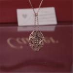Roman Serpenti necklace in 18 kt rose gold set with rubellite eyes and with pavé