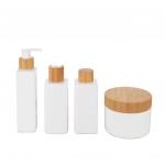 China 180ml White Lotion Cosmetic Bamboo Bottle With Bamboo Cap for sale