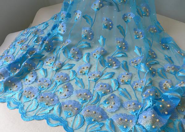 Quality Luxurious Embroidery Ice Blue Beaded Lace Fabric With Ginkgo Leaf Gold Pearl for sale