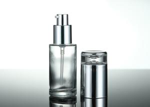 Wholesale 1 Oz Transparent Facial Serum Oil Empty Glass Lotion Bottle With Silver Pump Caps from china suppliers