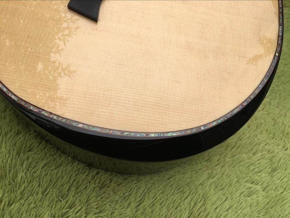 Cutaway 814s acoustic guitar,Solid spruce top,Ebony fingerboard,Real Abalone inlays and binding body cut