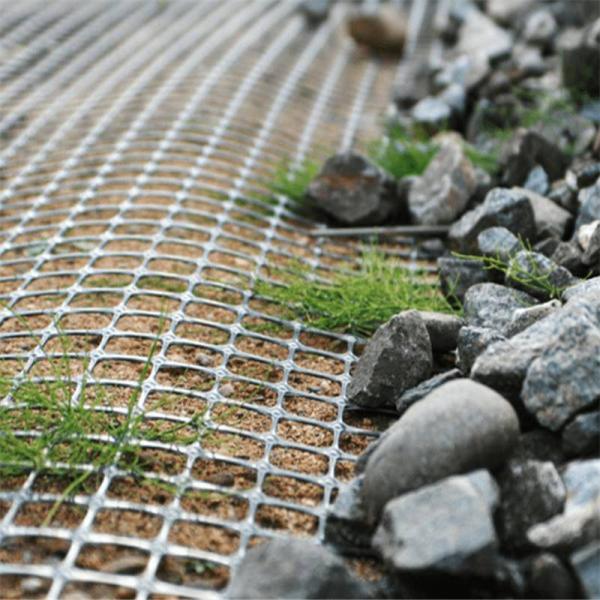Road Construction Reinforcement Geogrid Tensile Strength 15-60KN Mesh Size 12.7