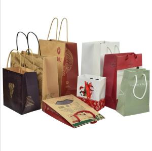 Wholesale 310*110*420mm gravure custom printed paper carry bags with handles Twisted from china suppliers