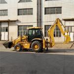 4 Wheel Drive Backhoe Loader Equipped With Hydraulic Breaking Hammer