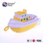 Plastic toy boat pull line drives the boat sailing