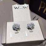 Piaget brand jewelry 18kt Piaget Rose earrings in 18K white gold set with 72