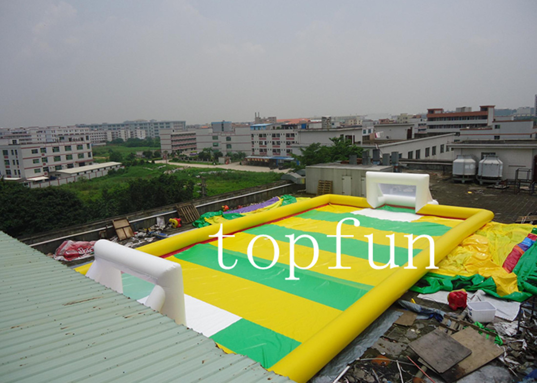 Fire Resistant Inflatable Football Field Sewn Stitching 14m X 8m