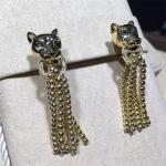 C earrings, 18K gold, inlaid with 34 round bright cut diamonds, Shafrey garnet