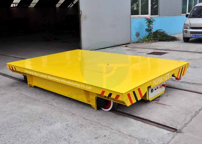 Battery powered self propelled motorized transfer trailer with intelligent charger