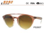 Sunglasses in fashionable design, made of plastic ,suitable for men and women