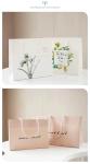 ODM 180gsm To 250gsm Present Paper Bags Clothing Wedding Favor Bags With Handles