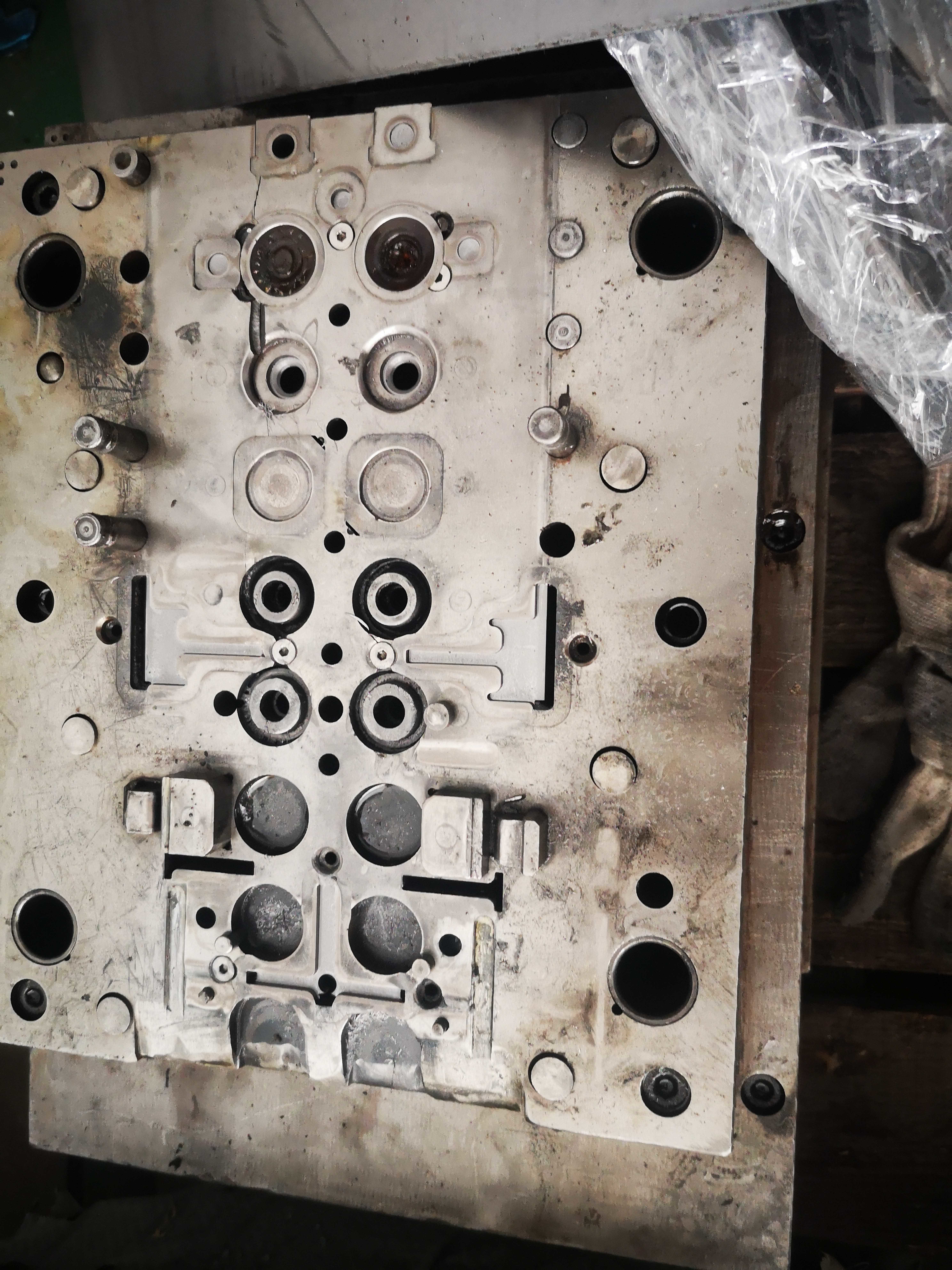 Custom Stamped Electrical Terminal Mounting Plates | Progressive Die Precision Metal Parts