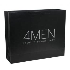 China Custom Matt Lamination Luxury Black Packaging Paper Bags For Clothes Packaging on sale
