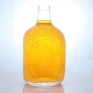 Wholesale Unique Round Shape Embossed Food Grade Rum Vodka Whisky Tequila Gin Glass Bottle with Cork Perfect from china suppliers