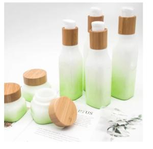 Wholesale Green Gradient OPAL Glass Bottle With Wood Lid Cap Cosmetic Lotion Container from china suppliers