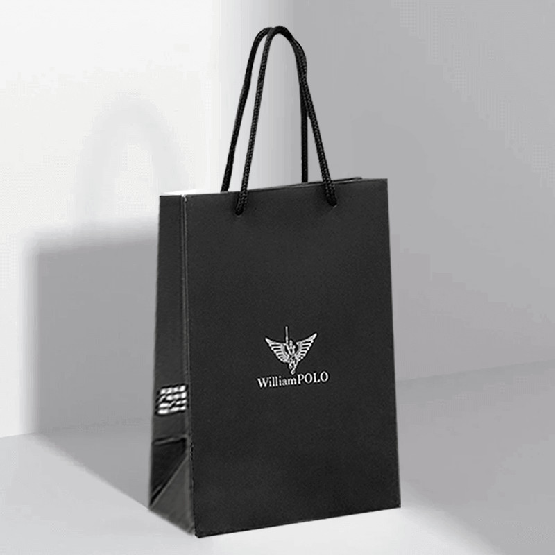 Custom Design Luxury Black Matte Thick Paper Clothing Packaging Gift Shopping Bag With Logo Ribbon And Handle