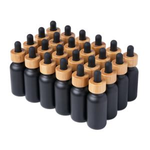 Wholesale K1011 Black Coated Round Glass Bottles Jar With Bamboo Dropper Cap from china suppliers