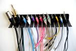 Single Tier Black Wall Mounted Metal Storage Rack for Entertainment Venue