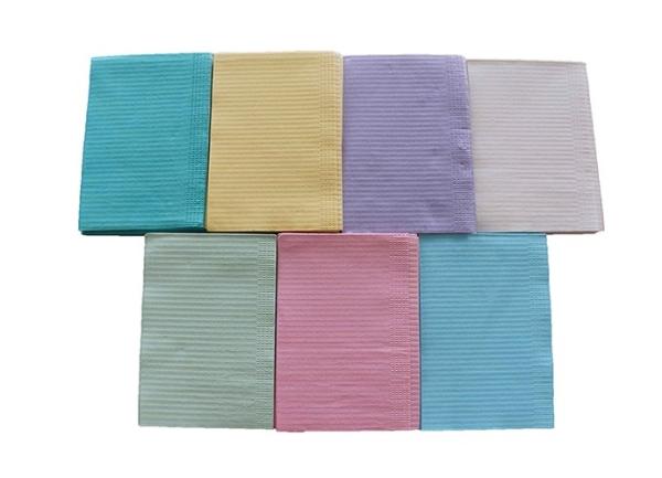 Disposable multi-colored dental paper laminated with film bib for medlical