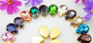 China Tear drop pear 18x25mm golden plating sew on rhinestone sewing buttons on sale