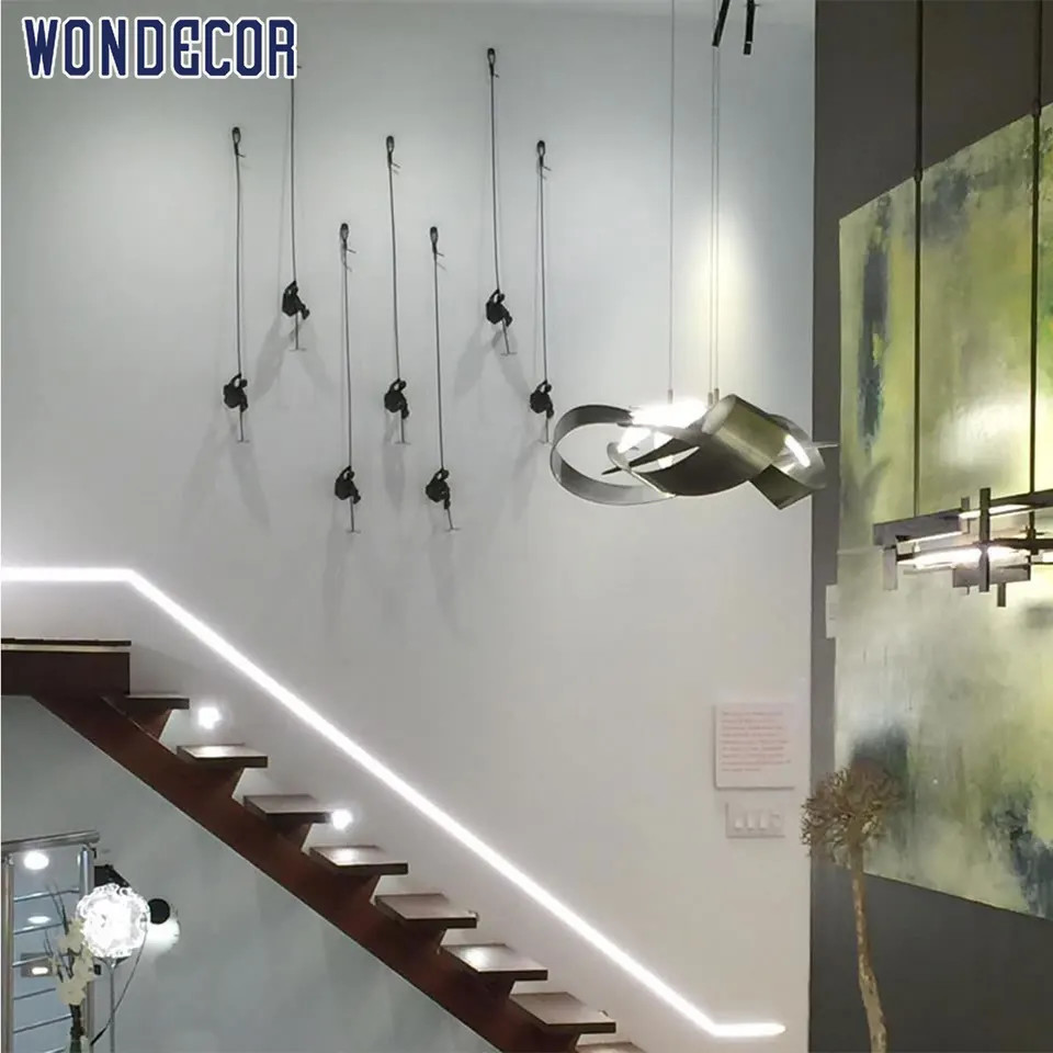 WONDERS Home decor Brass Wall Sculpture climb shape Dark Yellow