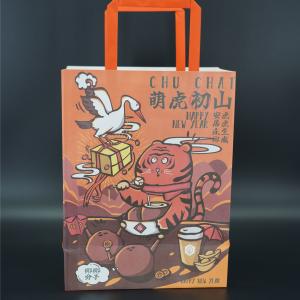 China OEM Personalized Kraft Paper Merchandise Bags With Handles Strong on sale