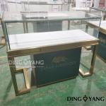 Green/Gold Color Combination for Our Showroom Display Cases Eye-Catching and