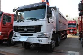 Wholesale SINOTRUK HOWO Dump Truck 371HP 12wheels LHD 31tons 20-30CBM ZZ3317N3567W from china suppliers