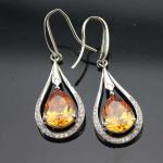 White Gold Plated 925 Silver 7x9mm Oval Amethyst Cubic Zirconia Earrings