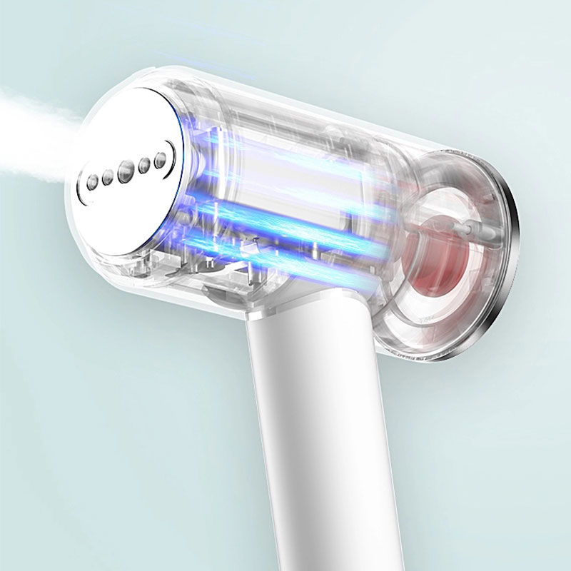 Compact Travel Garment Steamer with Hair Brush Accessory Product Size 23.25x17x7.4 cm
