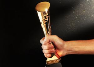 Wholesale Gold Plated Polyresin Trophy Cylinder Shape Year - End Bonus For Enterprise Staff from china suppliers