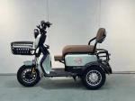 THE NEW SMALL ELECTRIC TRICYCLE BRINGS ITS OWN BABY TO THE HOME TO PICK UP