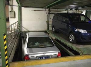 China Steel Structure Underground Car Parking Systems 4 Layers Hydraulic Car Parking Lift on sale