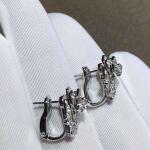 Piaget brand jewelry 18kt Piaget Rose earrings in 18K white gold set with 72