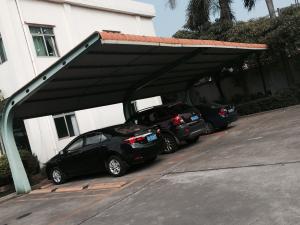 Wholesale 4 sets Small Cars Parking Shed Garage Steel Frame With Red Arc Shape Roof Top from china suppliers