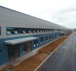 Rolled Up Door Prefabricated Steel Structure Warehouse Fire Resistance