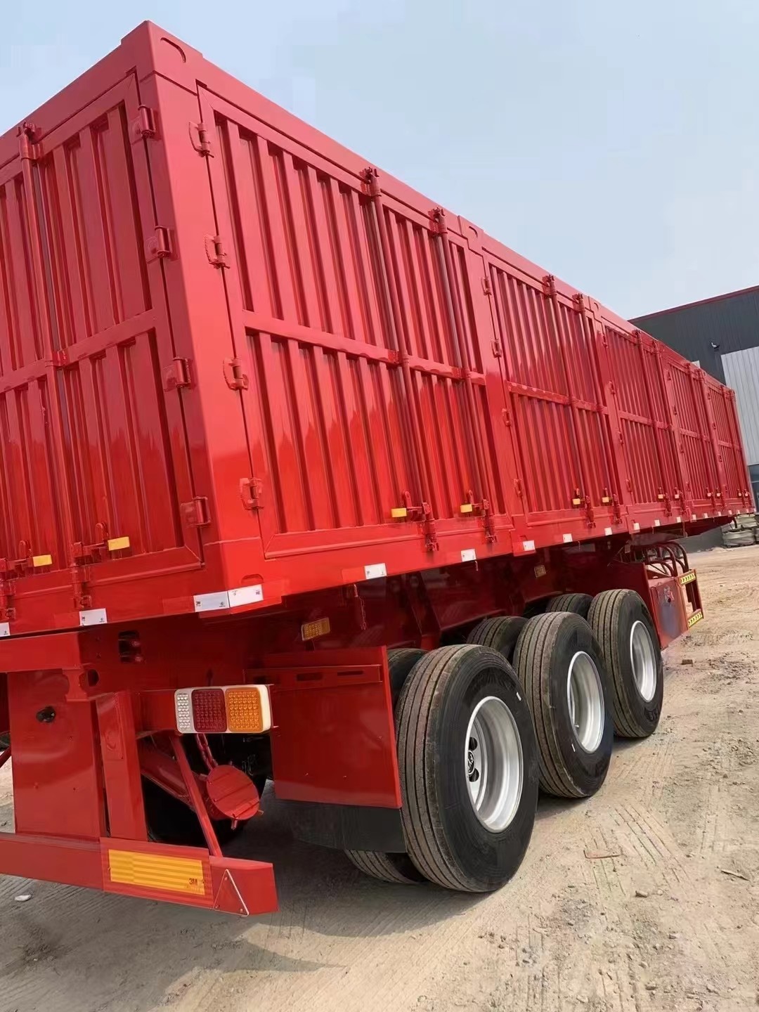 50cbm 80 Tons Tractor Side Dump Semi Trailer 3 Axles Side Tipper Semi Truck Trailer