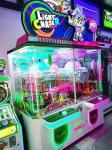 Coin Operated Amusement Park Kids Vending Game Dim Lighter Chaser Toys Dolls