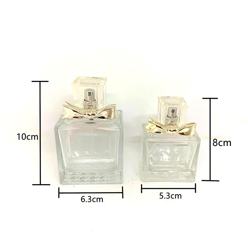 50ml 100ml Exquisite Perfume Bottle Glass Bottle Alloy Bow Spray Empty Bottle Matching Factory Customization