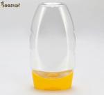 Food Grade Plastic Factory Price Special Plastic Honey Jar And Spoon 335ml Empty