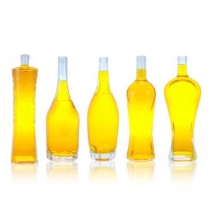 Wholesale Custom Cap 500ml 700ml 750ml Unique Shape Glass Bottle for Rum Vodka Whisky Tequila Gin from china suppliers